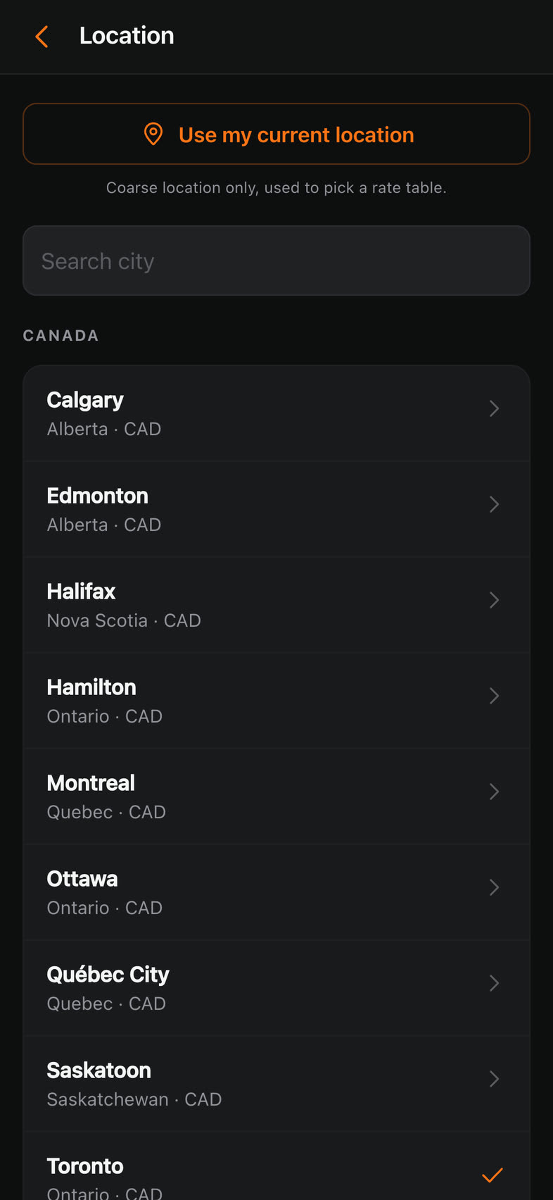 The city list in the app — Canadian, American and European cities, each with its own currency.